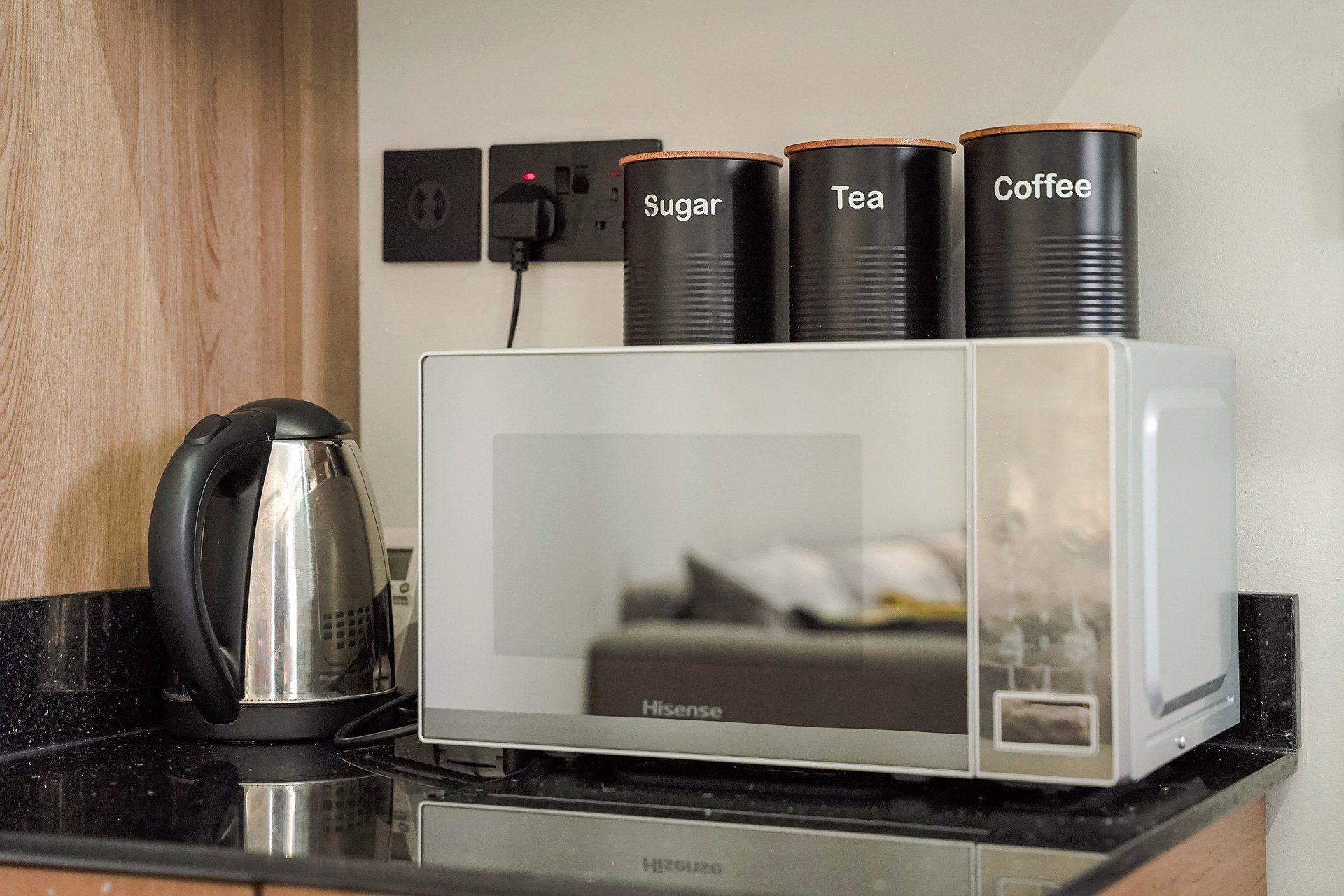 Kettle, microwave and canisters for sugar, tea and coffee
